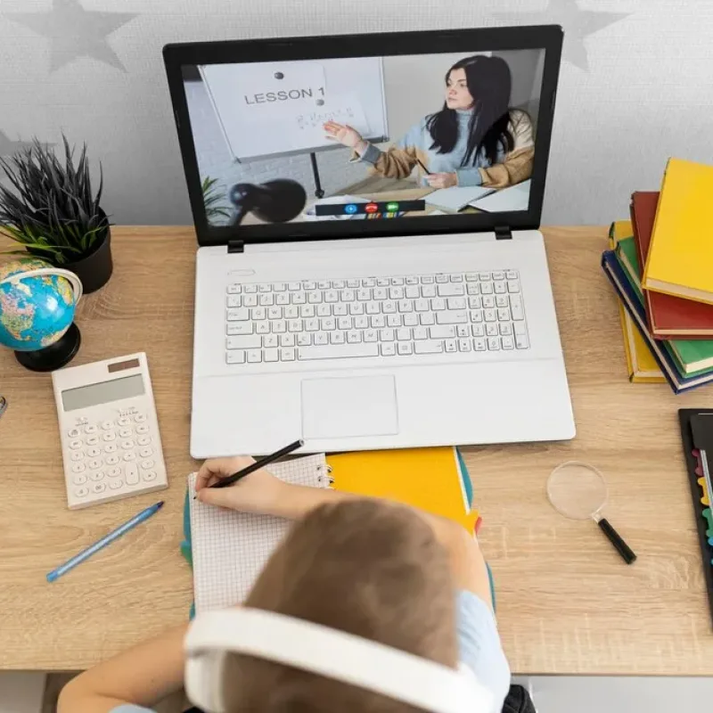 close-up-kid-learning-online_23-2148888835